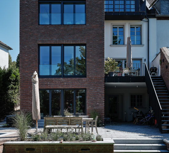 Gartenansicht Neubau und Bestandshaus