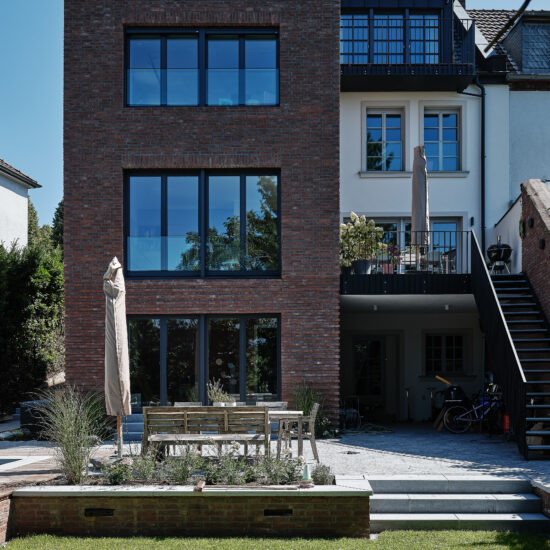Gartenansicht Neubau und Bestandshaus